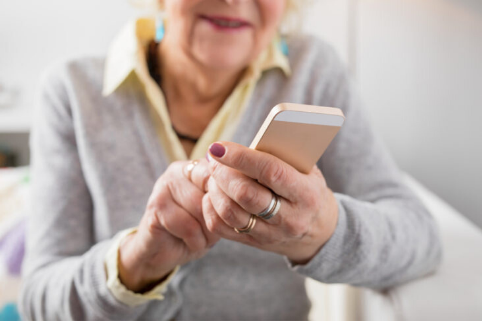 elderly lady using mobile phone