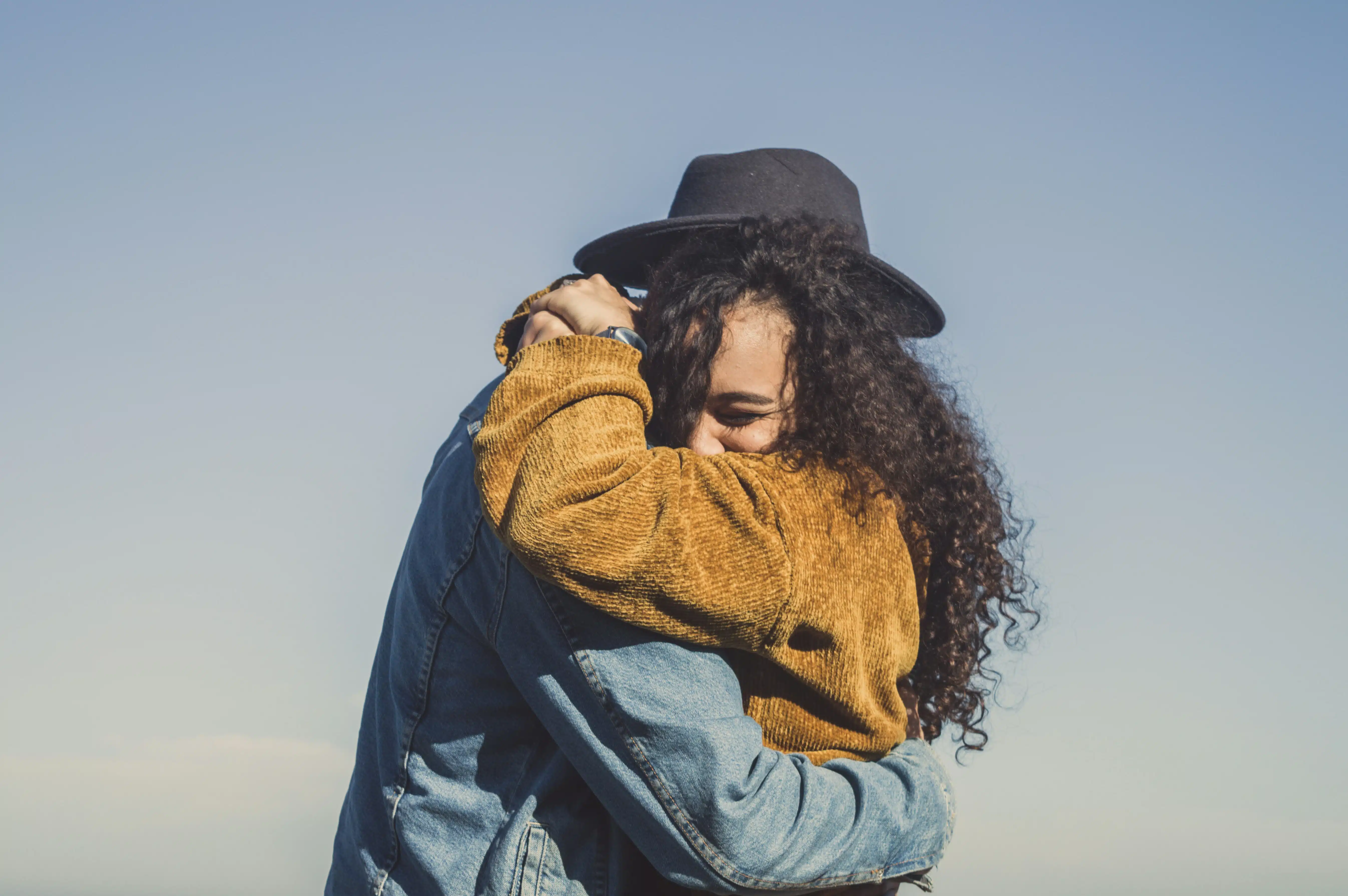 adult adhd 2 adults hugging outside